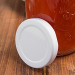 Acopa White Solid Milk Bottle Lid - 12/Case