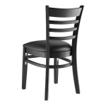 Lancaster Table & Seating Black Finish Wood Ladder Back Chair with Black Vinyl Seat - Detached Seat