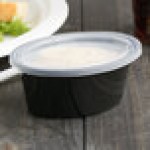 Pactiv Newspring E503-B ELLIPSO 3 oz. Black Oval Souffle / Portion Cup with Clear Lid - 500/Case Pactiv Newspring E503-B ELLIPSO 3 oz. Black Oval Souffle / Portion Cup with Clear Lid - 500/Case