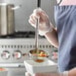 Vollrath 58055 6 oz. Two-Piece Stainless Steel Ladle with Black Kool-Touch® Handle