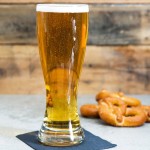 Anchor Hocking 80436RT 23 oz. Rim Tempered Pilsner Glass - 24/Case
