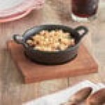 Valor 12 oz. Pre-Seasoned Mini Cast Iron Round Serving Bowl with Square Rustic Chestnut Finish Rubberwood Underliner
