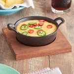Valor 12 oz. Pre-Seasoned Mini Cast Iron Round Serving Bowl with Square Rustic Chestnut Finish Rubberwood Underliner