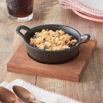 Valor 12 oz. Pre-Seasoned Mini Cast Iron Round Serving Bowl with Square Rustic Chestnut Finish Rubberwood Underliner