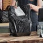 Choice 1/6 Standard Size Black Unprinted Medium-Duty Plastic T-Shirt Bag - 500/Case Choice 1/6 Standard Size Black Unprinted Medium-Duty Plastic T-Shirt Bag - 500/Case