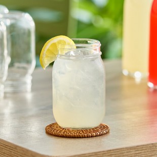 Sunkist Lemonade 4:1 Concentrate 32 fl. oz. - 12/Case Sunkist Lemonade 4:1 Concentrate 32 fl. oz. - 12/Case