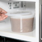 Choice Heavy-Duty 64 oz. Microwavable Translucent Heavy Weight Plastic Deli Lid - 100/Case