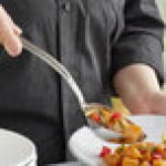 Vollrath 46722 Miramar® 2.66 oz. Stainless Steel Open Handle Solid Oval Serving Spoon