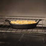 American Metalcraft CIPOV856 25 oz. Pre-Seasoned Mini Cast Iron Oval Casserole Dish American Metalcraft CIPOV856 25 oz. Pre-Seasoned Mini Cast Iron Oval Casserole Dish