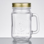 Acopa Rustic Charm 16 oz. County Fair Drinking Jar / Mason Jar with Handle and Gold Metal Lid - 12/Case