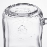 Acopa Rustic Charm 16 oz. County Fair Drinking Jar / Mason Jar with Handle and Gold Metal Lid - 12/Case