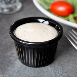 Tuxton BBX-0152 1.5 oz. Black Fluted China Ramekin - 48/Case