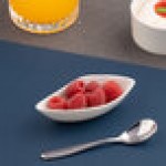 Ariane Miniature 0.67 oz. Ivory Asymmetric Oval Porcelain Coupe Bowl - 18/Case Ariane Miniature 0.67 oz. Ivory Asymmetric Oval Porcelain Coupe Bowl - 18/Case