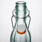 Arcoroc FJ014 8.5 oz. Swing Top Tinted Green Glass Bottle by Arc Cardinal - 24/Case Arcoroc FJ014 8.5 oz. Swing Top Tinted Green Glass Bottle by Arc Cardinal - 24/Case