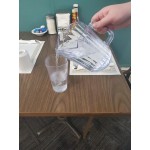 Choice 72 oz. Amber SAN Plastic Beverage Pitcher with 3 Spouts