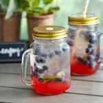 Acopa Rustic Charm 16 oz. Drinking Jar with Handle and Gold Metal Lid with Straw Hole - 12/Case