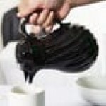 Vollrath 52142 SwirlServe Tilt & Pour 20 oz. Black Beverage Server Vollrath 52142 SwirlServe Tilt & Pour 20 oz. Black Beverage Server