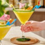 Acopa Tropic 24 oz. Martini Glass with Green Rim and Base - 12/Case