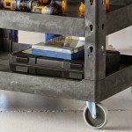 Lavex Large Black 3-Shelf Utility Cart with Ergonomic Handle and Built-In Tool Compartments - 43 1/8