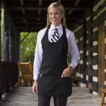 Uncommon Chef 3042 Black Customizable Poly-Cotton Twill Scoop Neck Tuxedo Apron with Adjustable Neck Strap and 3 Pockets - 28