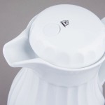 Vollrath 52130 SwirlServe Tilt & Pour 42 oz. White Beverage Server Vollrath 52130 SwirlServe Tilt & Pour 42 oz. White Beverage Server