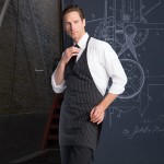 Uncommon Chef 3041 Pinstripe Customizable Poly-Cotton Twill V-Neck Tuxedo Apron with Adjustable Neck Strap and 2 Pockets - 28
