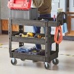 Lavex Medium Black 3-Shelf Utility Cart with Ergonomic Handle and Built-In Tool Compartments - 37 5/8
