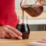Vollrath 1214LJ Dripcut® 16 oz. Clear Polycarbonate Teardrop Syrup Server Jar