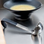 Vollrath 4970220 Jacob's Pride® 2 oz. One-Piece Stainless Steel Ladle with Short Black Kool-Touch® Handle Vollrath 4970220 Jacob's Pride® 2 oz. One-Piece Stainless Steel Ladle with Short Black Kool-Touch® Handle
