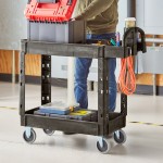 Lavex Medium Black 2-Shelf Utility Cart with Ergonomic Handle and Built-In Tool Compartments - 37 5/8