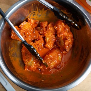 Texas Pete 1 Gallon Mild Buffalo Style Chicken Wing Sauce - 4/Case Texas Pete 1 Gallon Mild Buffalo Style Chicken Wing Sauce - 4/Case