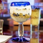 Libbey 92309 Aruba 16 oz. Customizable Round Cocktail Glass with Cobalt Blue Rim and Base - 12/Case