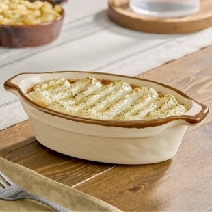 Acopa Keystone 18 oz. Vanilla Bean Porcelain Oval Baker / Casserole Dish - Sample