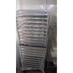Regency 10 Pan End Load Half Height Bun / Sheet Pan Rack with Cover and 12 Pans - Unassembled Regency 10 Pan End Load Half Height Bun / Sheet Pan Rack with Cover and 12 Pans - Unassembled
