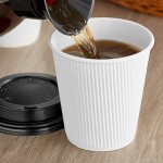 Choice 10 oz. Double Wall Ripple White Paper Hot Cup and Black Lid - 100/Case Choice 10 oz. Double Wall Ripple White Paper Hot Cup and Black Lid - 100/Case