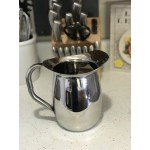 Acopa 96 oz. Hammered Stainless Steel Bell Pitcher with Ice Guard