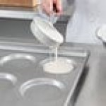 Chicago Metallic 41002 Glazed Aluminized Steel 15 Mold 3.32 oz. Individual Hamburger Bun / Muffin Top / Cookie Pan - 17 3/4
