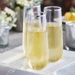 Visions Dynasty 9 oz. Clear Plastic Stemless Champagne Flute with Silver Rim - 64/Case Visions Dynasty 9 oz. Clear Plastic Stemless Champagne Flute with Silver Rim - 64/Case
