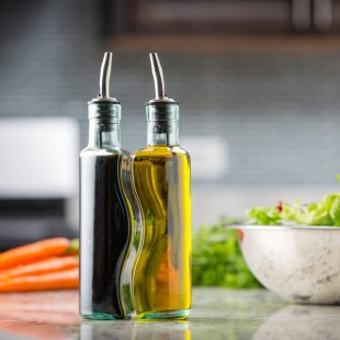 TableCraft Gemelli 8.5 oz. 3-Piece Clear Glass Oil and Vinegar Cruet Set with Stainless Steel Rack - 6/Case