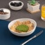 Ariane Vital Coupe 15.56 oz. Warm White Slanted Porcelain Coupe Bowl - 8/Case Ariane Vital Coupe 15.56 oz. Warm White Slanted Porcelain Coupe Bowl - 8/Case