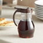 Vollrath 1414-01 Dripcut® 16 oz. Clear Polycarbonate Teardrop Syrup Server with Brown Top Vollrath 1414-01 Dripcut® 16 oz. Clear Polycarbonate Teardrop Syrup Server with Brown Top
