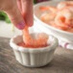 Carlisle 4394342 2 oz. Ivory Bone Scalloped Melamine Ramekin - 48/Case Carlisle 4394342 2 oz. Ivory Bone Scalloped Melamine Ramekin - 48/Case