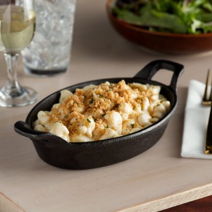Vollrath 59743 25.4 oz. Pre-Seasoned Mini Cast Iron Oval Casserole Dish