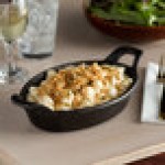 Vollrath 59743 25.4 oz. Pre-Seasoned Mini Cast Iron Oval Casserole Dish
