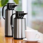 Service Ideas Coffee-At-A-Touch 64.2 oz. Stainless Steel Insulated Coffee Carafe / Server with Black Push-Button Lid HPS191