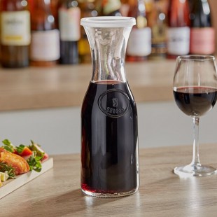 Libbey 33.875 oz. Glass Carafe and Plastic Lid Set - 12 Glasses, 24 Lids Libbey 33.875 oz. Glass Carafe and Plastic Lid Set - 12 Glasses, 24 Lids