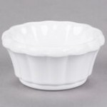 Carlisle 4394242 1 oz. Ivory Bone Scalloped Melamine Ramekin - 48/Case