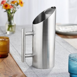 Acopa 44 oz. Stainless Steel Pitcher with Angled Top and Ice Guard Acopa 44 oz. Stainless Steel Pitcher with Angled Top and Ice Guard