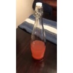 Acopa 32 oz. Textured Glass Water Bottle with Clear Swing Top Lid - 6/Case