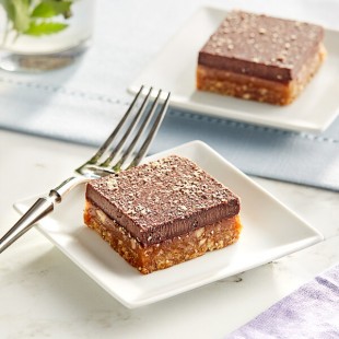 Nats Rawline Plant-Based Vegan Caramel and Chocolate Raw Cake Square 2.3 oz. - 12/Case Nats Rawline Plant-Based Vegan Caramel and Chocolate Raw Cake Square 2.3 oz. - 12/Case